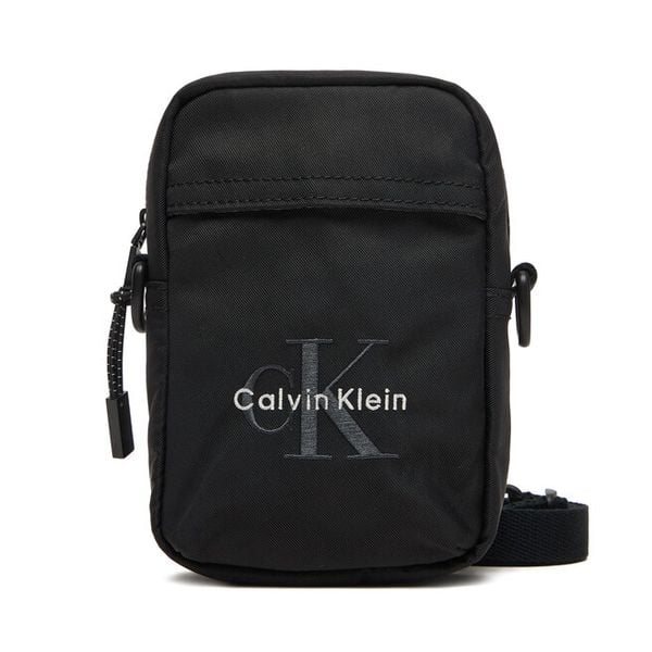 Saszetka Calvin Klein. Czarne saszetki i nerki męskie Calvin Klein, bez wzorów, z nylonu. Za 149.99 zł.