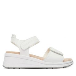 Sandały Caprice. Białe sandały damskie Caprice, bez wzorów, bez obcasa, na koturnie, bez zapięcia. Za 329.99 zł.