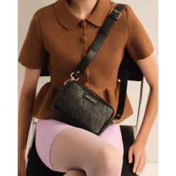 Torebka Nine West. Czarne listonoszki damskie Nine West, bez wzorów, bez dodatków. Za 219.99 zł.