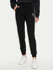 Guess Spodnie dresowe Elea V4YB02 KCDN0 Czarny Regular Fit. Czarne spodnie dresowe damskie Guess, z aplikacjami, z dresówki. Za 359.99 zł.