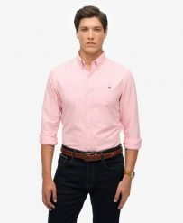 Superdry Klasyczna koszula Oxford z długim rękawem z bawełny organicznej. Czerwone koszule damskie Superdry, xl, bez wzorów, z bawełny, klasyczne, bez kołnierzyka, bez ramiączek. Za 280.80 zł.