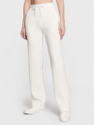 Guess Spodnie dresowe V3RB21 K7UW2 Écru Regular Fit. Spodnie dresowe damskie Guess, z aplikacjami, z dresówki. Za 209.99 zł.