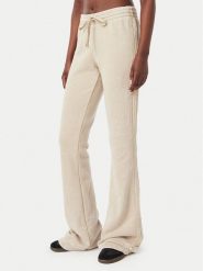 Adidas Spodnie dresowe Sst Bootcut Pant KT1915 Beżowy Bootcut Fit. Brązowe spodnie dresowe damskie Adidas, bez wzorów, z bawełny. Za 349.99 zł.