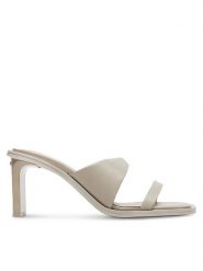 Calvin Klein Klapki Heel Slide 70 Lth HW0HW02072 Beżowy. Brązowe klapki damskie Calvin Klein, bez wzorów, ze skóry, bez obcasa, bez zapięcia. Za 559.99 zł.