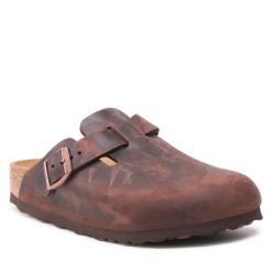 Klapki Birkenstock. Brązowe klapki damskie Birkenstock, bez wzorów, bez obcasa, bez zapięcia. Za 679.99 zł.