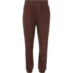 Damskie spodnie dresowe Athlecia Elaina. Brązowe spodnie dresowe damskie Athlecia, na lato, bez wzorów, z dresówki, sportowe, trekkingowe. Za 257.00 zł.