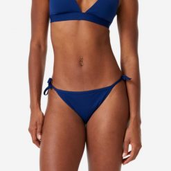 Dół kostiumu kąpielowego damski Decathlon Sandy Zuma. Niebieskie bikini OLAIAN, bez wzorów, z elastanu. Za 39.99 zł.