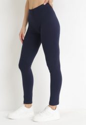 Granatowe Bawełniane Legginsy z Gumką w Pasie i Niskim Stanem Lexuna. Niebieskie legginsy damskie Born2be, bez wzorów, z bawełny. Za 9.99 zł.