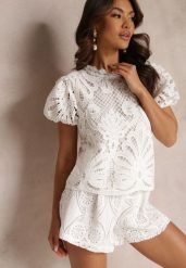 Biała Bluzka Koronkowa Fanoos. Białe bluzki damskie Renee, m, w ażurowe wzory, z koronki, vintage, bez kołnierzyka, bez ramiączek. Za 74.99 zł.