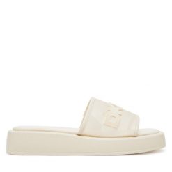 Klapki DKNY. Klapki damskie DKNY, bez wzorów, bez obcasa, bez zapięcia. Za 389.99 zł.