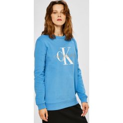 Calvin Klein Jeans - Bluza. Niebieskie bluzy damskie Calvin Klein Jeans, l, bez wzorów, z bawełny, bez ramiączek, bez kaptura. W wyprzedaży za 259.90 zł.