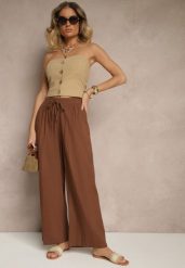 Brązowe Spodnie High Waist Szerokie z Bawełny Wiązane w Pasie z Gumką w Talii Yaslio. Brązowe spodnie materiałowe damskie Renee, bez wzorów, z bawełny, eleganckie, z podwyższonym stanem. Za 39.99 zł.
