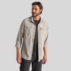 Koszula podróżnicza męska Craghoppers NosiLife Adventure LS Shirt III. Zielone koszule męskie Craghoppers, m, bez wzorów, casualowe, bez kołnierzyka, bez ramiączek. Za 377.99 zł.