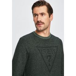 Guess Jeans - Sweter. Zielone swetry męskie Guess Jeans, m, bez wzorów, z bawełny, bez kołnierzyka, bez ramiączek. W wyprzedaży za 169.90 zł.