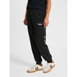 Damskie spodnie dresowe Hummel Legacy 2.0. Czarne spodnie dresowe damskie Hummel, na lato, bez wzorów, z dresówki, sportowe, trekkingowe. Za 269.50 zł.