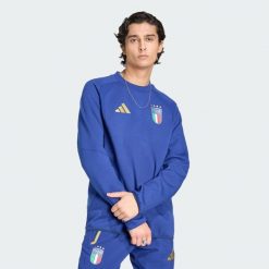 Bluza Włochy Tiro Travel Crew. Bluzy damskie Adidas, m, bez wzorów, z bawełny, klasyczne, bez ramiączek, bez kaptura. Za 259.00 zł.