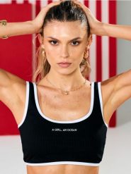 Góra od bikini typu top z kontrastową lamówką i napisem - czarny. Czarne stroje kąpielowe damskie Sinsay, l, bez wzorów. Za 29.99 zł.