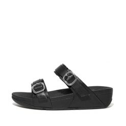 Kobiece klapki na koturnie FitFlop Lulu. Czarne klapki damskie FIT FLOP, bez wzorów, eleganckie, bez obcasa, na koturnie, bez zapięcia. Za 565.50 zł.