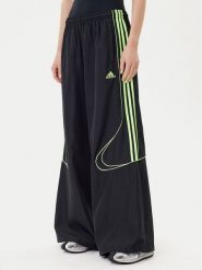 Adidas Spodnie dresowe Teamgeist adicolor JV7478 Czarny Oversize. Czarne spodnie dresowe damskie Adidas, bez wzorów, z dresówki. Za 279.99 zł.