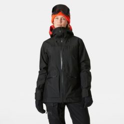 Damska kurtka narciarska Helly Hansen Powderqueen 3.0. Czarne kurtki sportowe damskie Helly Hansen, na zimę, bez wzorów, bez ramiączek, bez kaptura, narciarskie. W wyprzedaży za 1,676.50 zł.