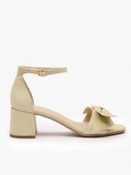 Jasnozielone sandały z kokardą. Zielone sandały damskie Ryłko, bez wzorów, ze skóry, bez obcasa, na obcasie, bez zapięcia. Za 429.99 zł.