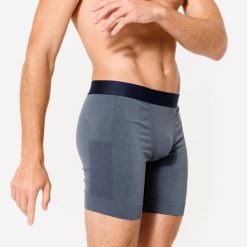 Bokserki męskie długie. Niebieskie bokserki męskie Decathlon, bez wzorów, z materiału. Za 59.99 zł.