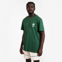 Koszulka do gry w koszykówkę unisex Tarmak NBA Celtics TS 900. Zielone bluzki damskie TARMAK, m, bez wzorów, z bawełny, sportowe, bez kołnierzyka, bez ramiączek. Za 79.99 zł.