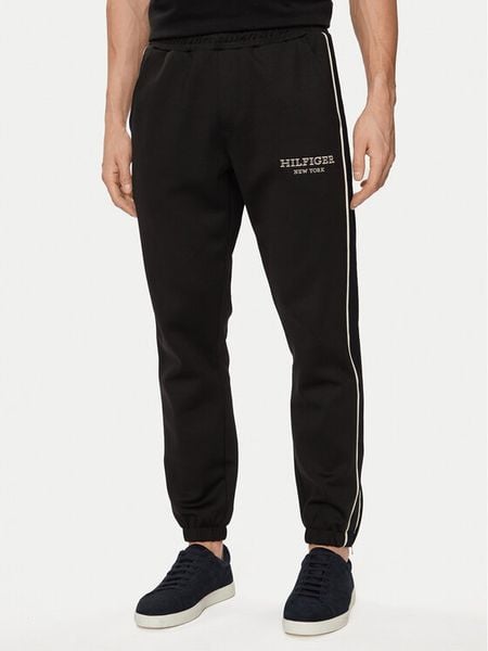 Tommy Hilfiger Spodnie dresowe Monotype MW0MW33701 Czarny Regular Fit. Czarne spodnie sportowe męskie Tommy Hilfiger, m, bez wzorów, z bawełny. Za 379.99 zł.