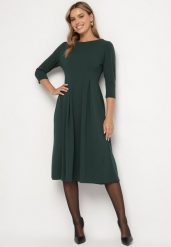 Ciemnozielona Rozkloszowana Sukienka Ozdobiona Przeszyciami Reamira. Zielone sukienki damskie Born2be, na co dzień, s, bez wzorów, eleganckie, bez kołnierzyka, bez ramiączek, midi, rozkloszowane. Za 99.99 zł.