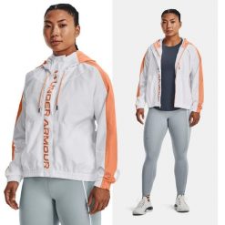 Kurtka sportowa damska UNDER ARMOUR Rush Woven z kapturem. Białe kurtki sportowe damskie Under Armour, m, bez wzorów, bez ramiączek, z kapturem. Za 209.99 zł.