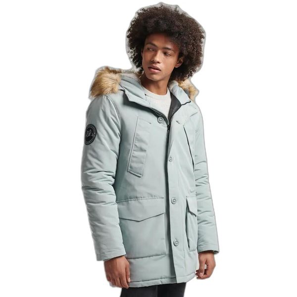 Parka Superdry Everest. Niebieskie parki męskie Superdry, na zimę, uniwersalny, z aplikacjami, z elastanu, klasyczne, bez kołnierzyka, z kapturem. Za 842.20 zł.
