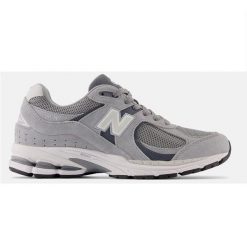Trampki New Balance Sr. Białe trampki męskie New Balance, bez wzorów, z materiału, eleganckie, bez zapięcia. Za 853.99 zł.