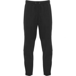 Spodnie Do Biegania Dla Dorosłych Unisex Neapolis. Czarne spodnie sportowe damskie ROLY, na lato, bez wzorów, sportowe, do biegania. Za 84.99 zł.