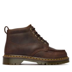 Trzewiki Dr. Martens. Brązowe botki damskie Dr. Martens, bez wzorów, bez obcasa, na płaskiej podeszwie, bez zapięcia. Za 989.99 zł.