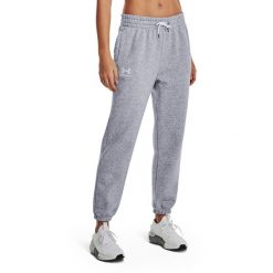 Spodnie treningowe damskie Under Armour Essential Fleece Joggers. Szare spodnie dresowe damskie Under Armour, bez wzorów, sportowe, na fitness i siłownię. Za 209.99 zł.