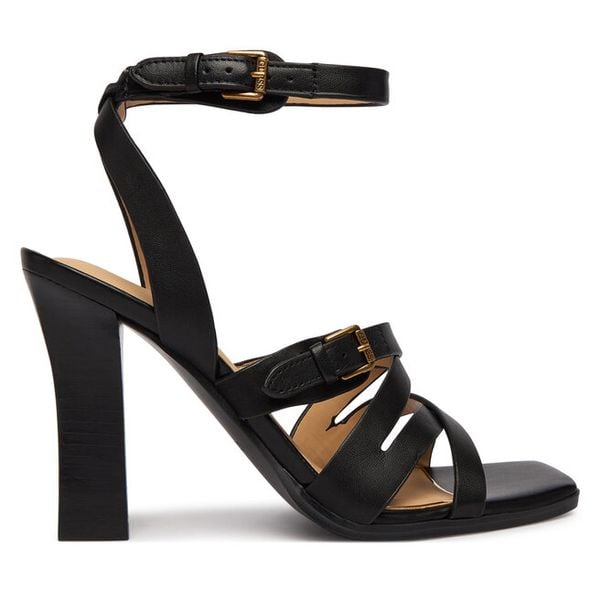 Sandały Guess. Czarne sandały damskie Guess, z aplikacjami, bez obcasa, na słupku, bez zapięcia. Za 377.99 zł.