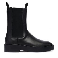 Sztyblety Calvin Klein. Czarne botki damskie Calvin Klein, bez wzorów, bez obcasa, na płaskiej podeszwie, bez zapięcia. Za 669.99 zł.