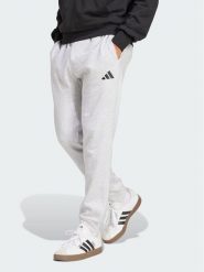 Adidas Spodnie dresowe Essentials Feelcozy Fleece JE3819 Szary jasny Regular Fit. Szare spodnie materiałowe męskie Adidas, m, bez wzorów, z dresówki. Za 219.99 zł.
