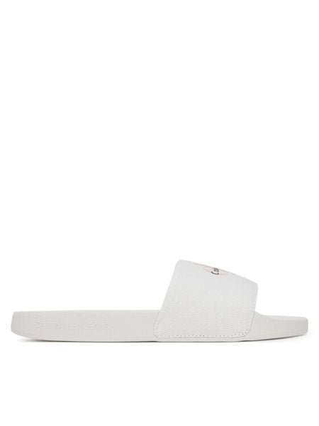 Calvin Klein Jeans Klapki Slide Monogram Wn Logo Ck YW0YW01967 Biały. Białe klapki damskie Calvin Klein Jeans, bez wzorów, z jeansu, bez obcasa, bez zapięcia. Za 129.99 zł.