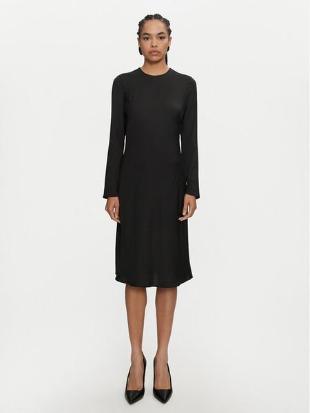 Calvin Klein Sukienka codzienna K20K207683 Czarny Regular Fit. Czarne sukienki damskie Calvin Klein, na co dzień, bez wzorów, z syntetyku, bez kołnierzyka, bez ramiączek, proste. Za 679.99 zł.