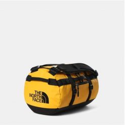 Torba Base Camp XS Żółty - NF0A52SS4WP. Żółte torby podróżne damskie The North Face, bez wzorów, z materiału. W wyprzedaży za 483.95 zł.