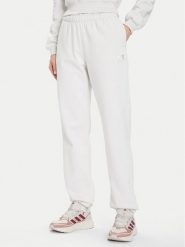 Under Armour Spodnie dresowe Ua Icon 6003676 Écru Loose Fit. Spodnie dresowe damskie Under Armour, bez wzorów, z dresówki. Za 269.99 zł.