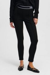 KARL LAGERFELD Czarne damskie legginsy. Czarne legginsy damskie KARL LAGERFELD, bez wzorów, z materiału. W wyprzedaży za 389.99 zł.