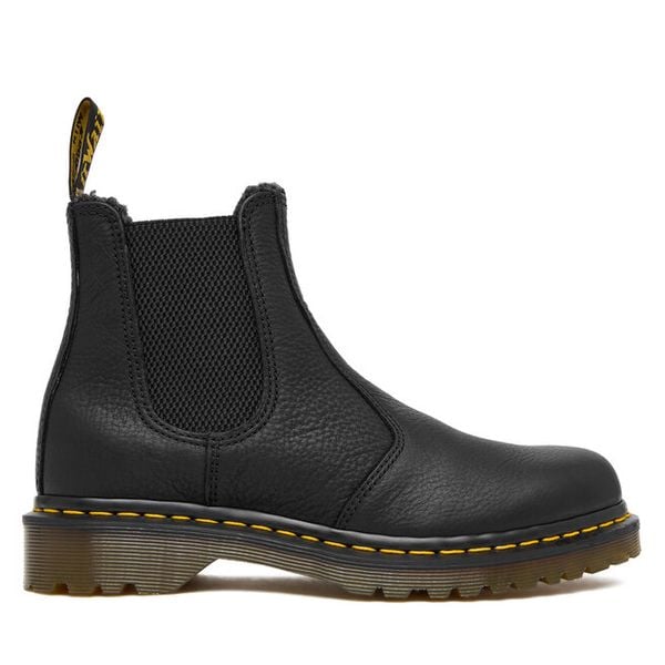 Sztyblety Dr. Martens. Czarne botki damskie Dr. Martens, bez wzorów, bez obcasa, na płaskiej podeszwie, bez zapięcia. Za 669.99 zł.