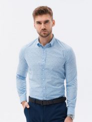 Koszula męska z długim rękawem w mikro wzór - błękitna V3. Niebieskie koszule męskie Ombre Clothing, m, bez wzorów, z bawełny, bez kołnierzyka, bez ramiączek. W wyprzedaży za 39.99 zł.