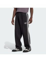 Adidas Spodnie dresowe adicolor Spacer Track JX1506 Czarny Baggy Fit. Czarne komplety dresowe męskie Adidas, m, bez wzorów, z bawełny. Za 349.99 zł.