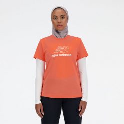 Koszulka damska New Balance WT41816GFR – pomarańczowa. Brązowe bluzki damskie New Balance, l, bez wzorów, z materiału, eleganckie, bez kołnierzyka, bez ramiączek. Za 69.99 zł.