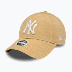 Czapka z daszkiem damska New Era Jersey 9Forty New York Yankees. Brązowe czapki damskie New Era, bez wzorów, z jersey, sportowe. Za 109.99 zł.