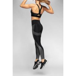 Legginsy treningowe z wysokim stanem 4FPro SPDF413 - czarny. Czarne legginsy damskie 4F, bez wzorów, z dzianiny. W wyprzedaży za 129.99 zł.