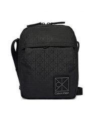 Calvin Klein Saszetka Utility Emblem Reporter LV04D3303G Czarny. Czarne saszetki i nerki męskie Calvin Klein, bez wzorów, z materiału. Za 329.99 zł.